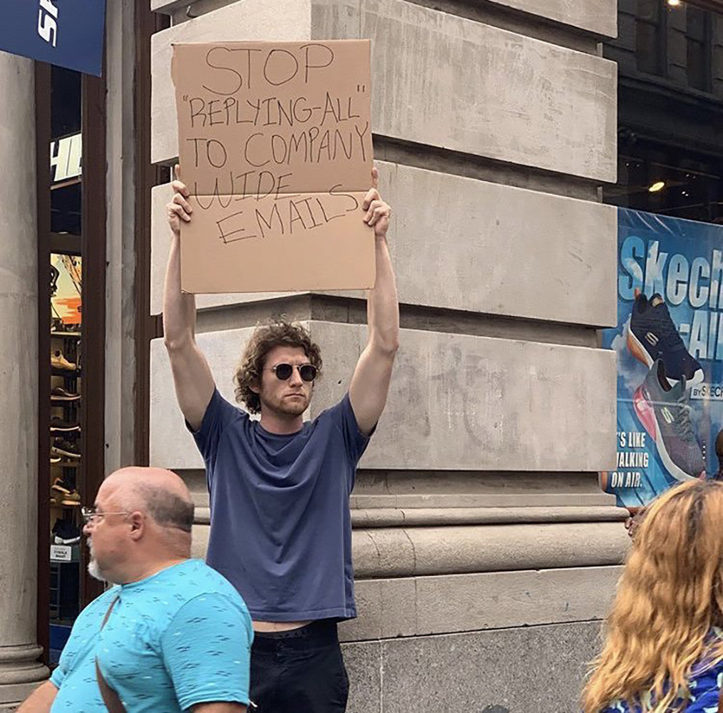dude with signs