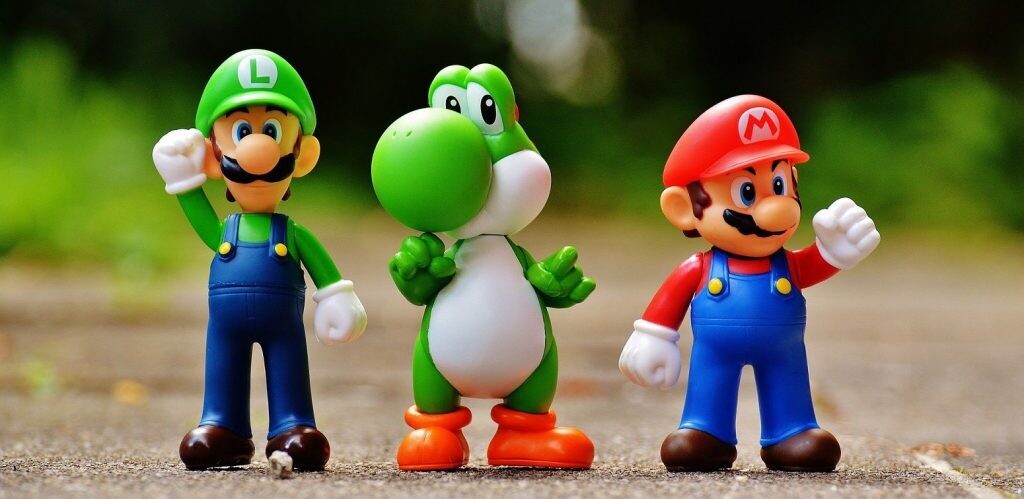 Mario con su hermano Luigi y su amigo Yoshi